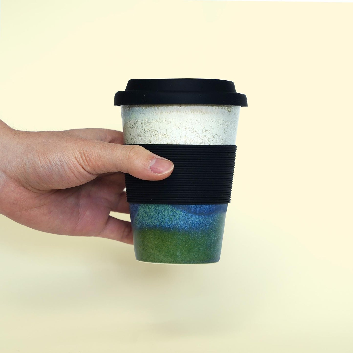 11oz Green ceramic mug with black lid and sleeve- Large capacity travel cup for long commutes. Thermal retaining, spill-proof silicone cover
