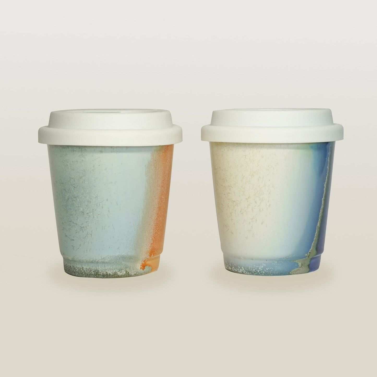 Petite 9oz Sky Blue & orange ceramic cup with white lid - Slim design for petite hands, fits small purses.